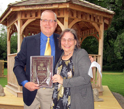 Margo Sue Bittner receives her award from Barker Lions Club.